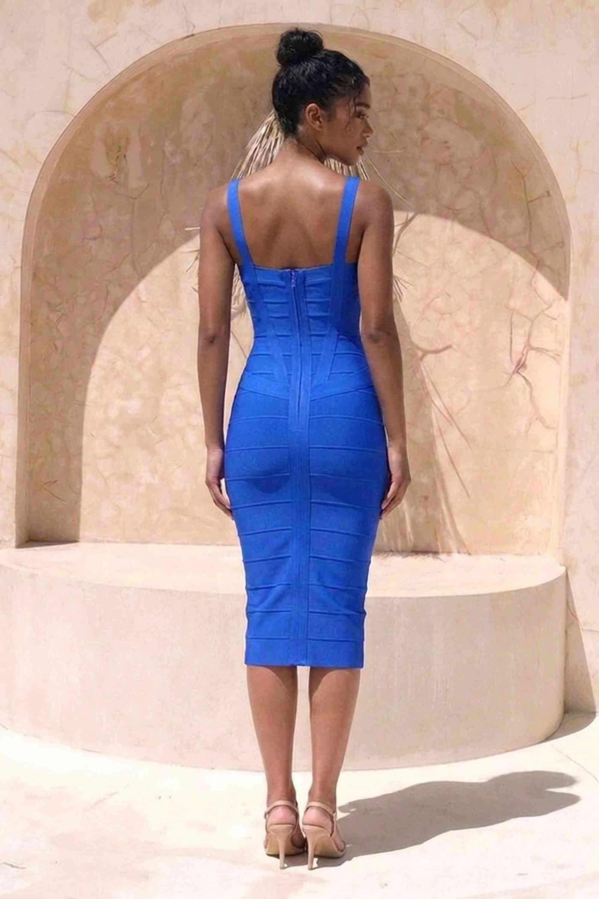 Woman wearing a figure flattering royal blue party dress Heidi Bandage Midi Dress - Royal Blue Bodycon Collection