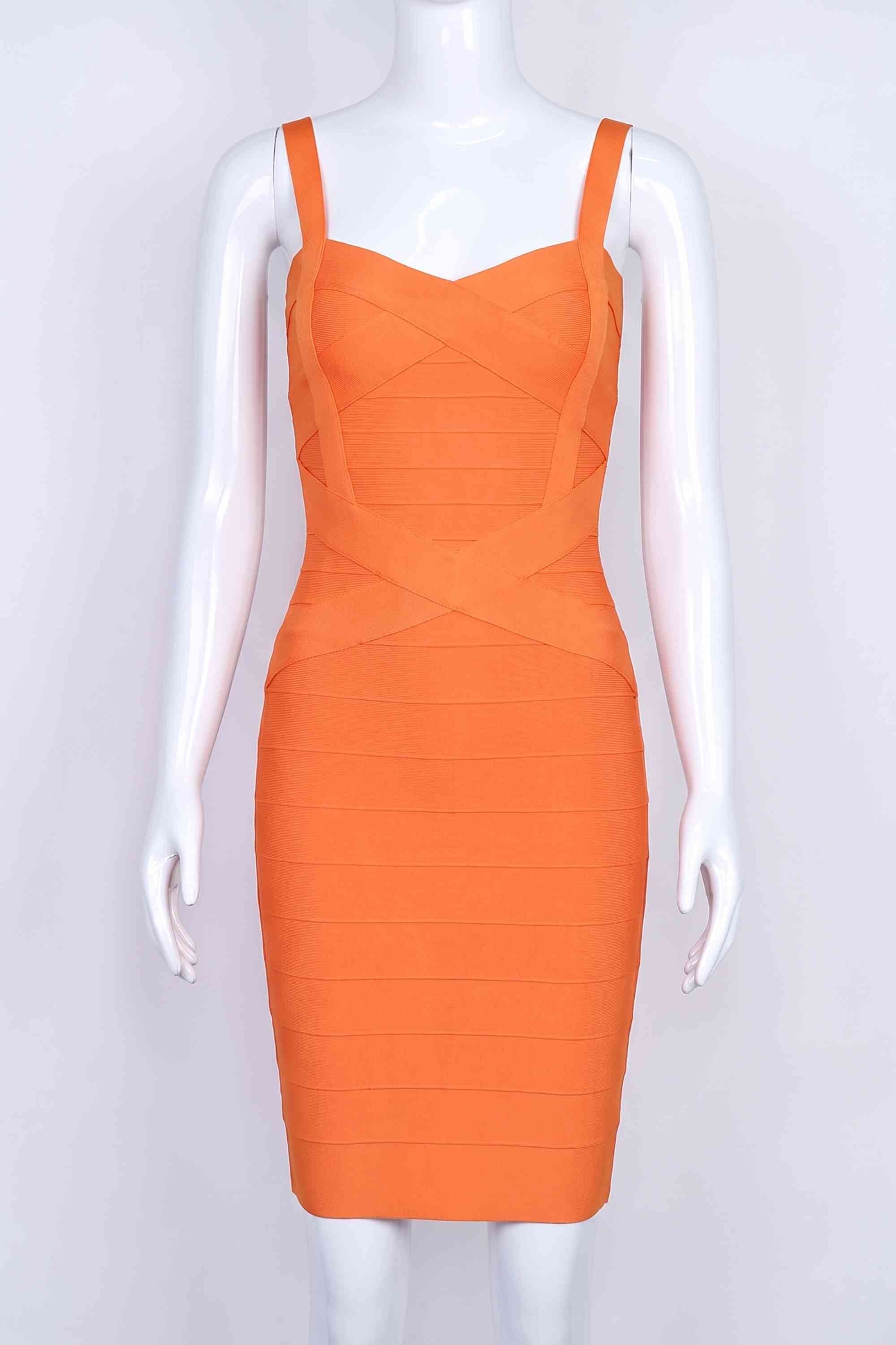Woman wearing a figure flattering  Heidi Bandage Mini Dress - Apricot Orange Bodycon Collection