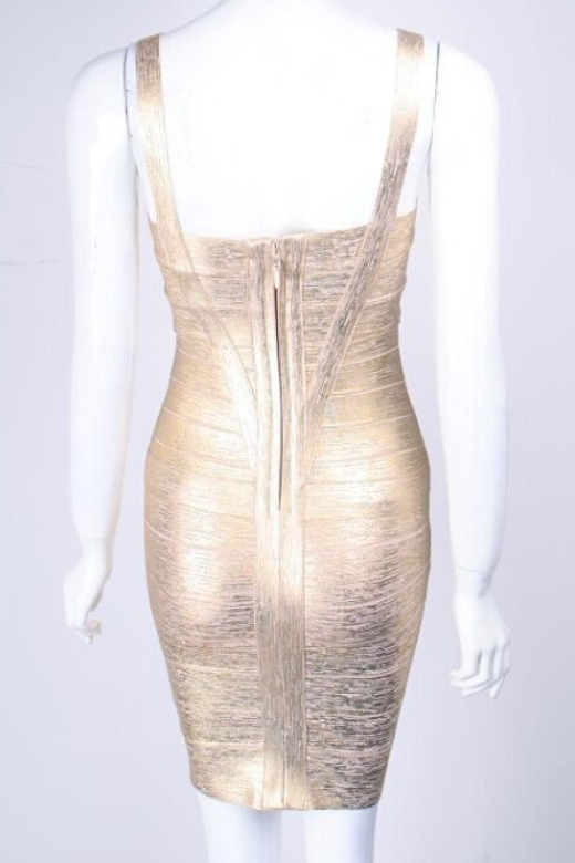 Woman wearing a figure flattering  Heidi Bandage Mini Dress - Gold Bodycon Collection