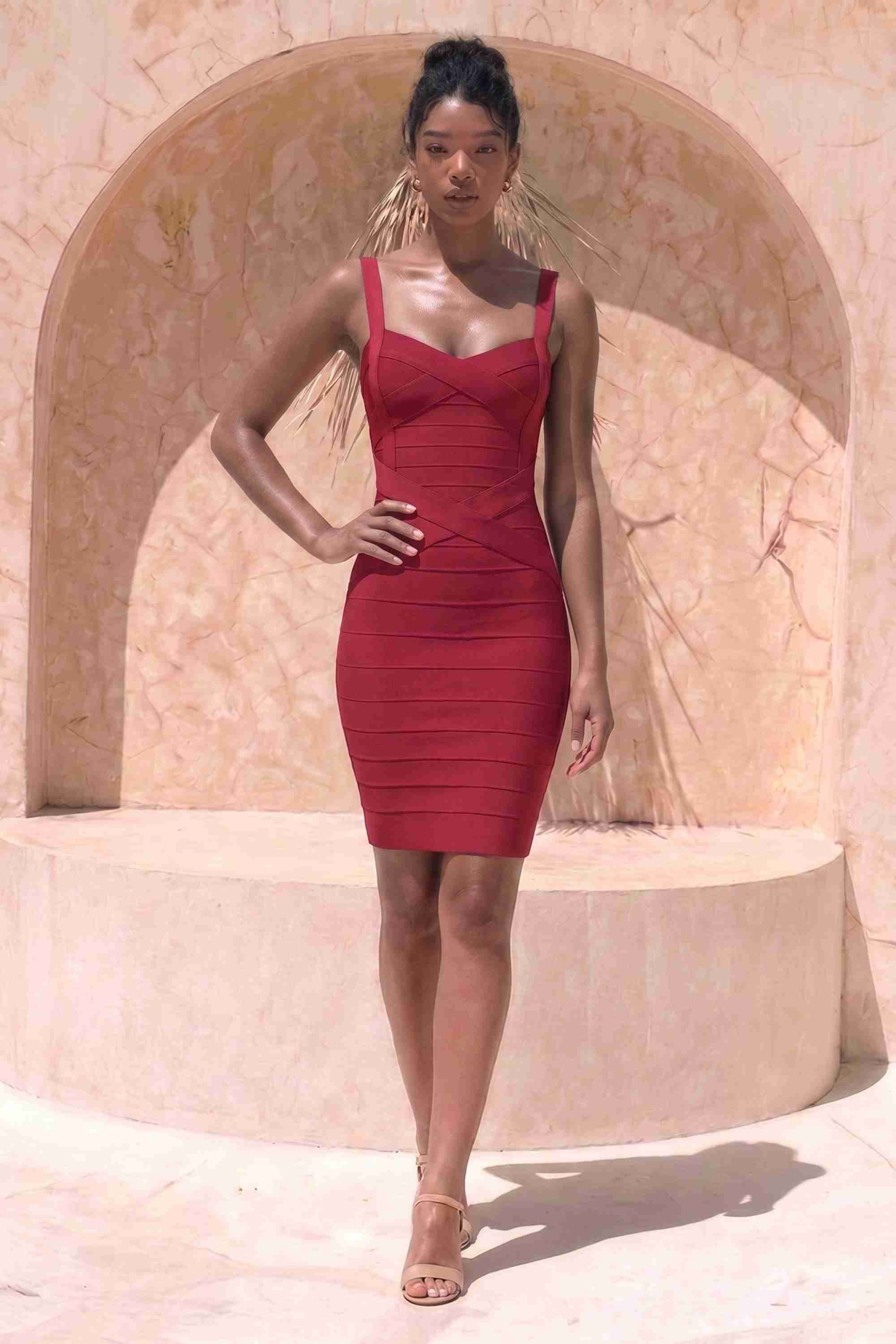 Woman wearing a figure flattering  Heidi Bandage Mini Dress - Red Wine Bodycon Collection