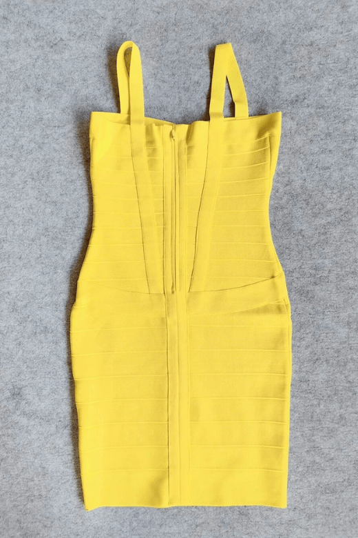 Woman wearing a figure flattering  Heidi Bandage Mini Dress - Sun Yellow Bodycon Collection