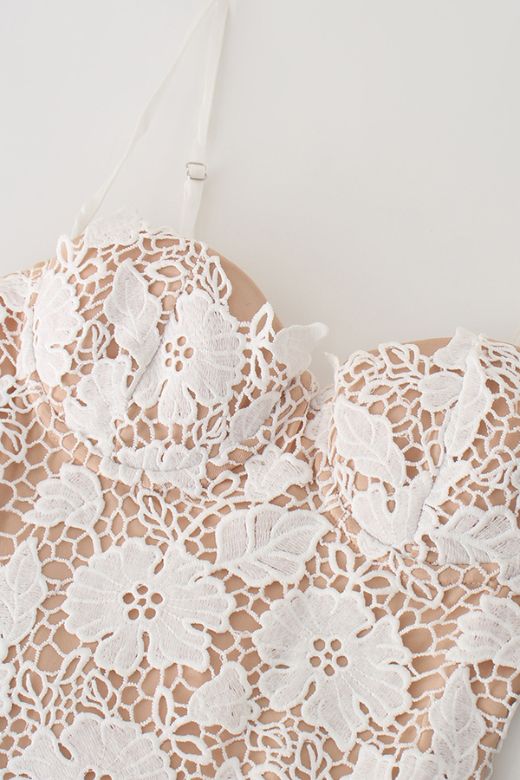 Woman wearing a figure flattering  Honor Bodycon Maxi Dress - Pearl White BODYCON COLLECTION