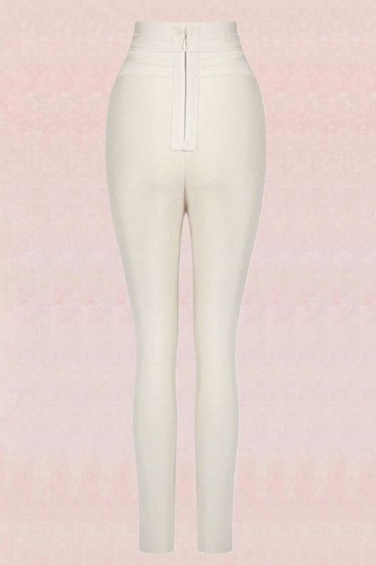Woman wearing a figure flattering  High Waist Bandage Jumpsuit Pant - Cream BODYCON COLLECTION