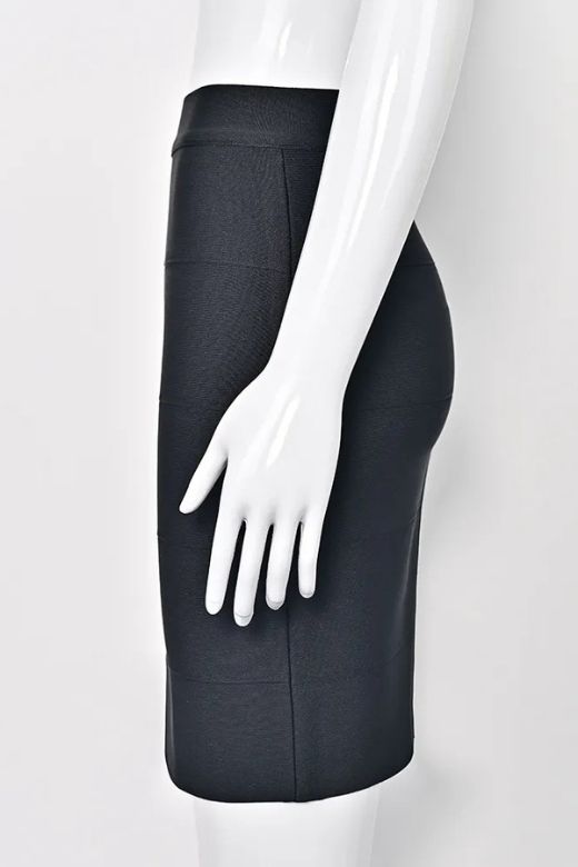 Woman wearing a figure flattering  High Waist Bandage Mini Skirt - Classic Black BODYCON COLLECTION