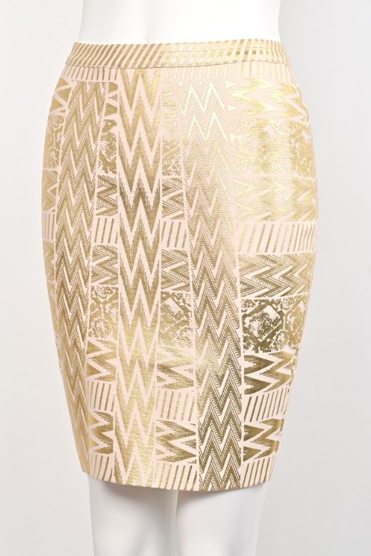Woman wearing a figure flattering  High Waist Metallic Leather Mini Skirt - Gold BODYCON COLLECTION
