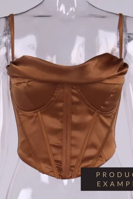 Woman wearing a figure flattering  Indi Corset Crop Top - Apricot Orange BODYCON COLLECTION