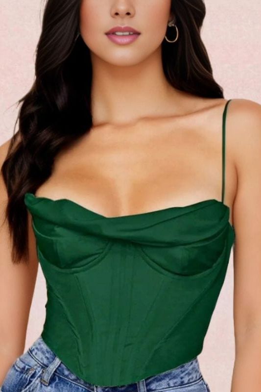 Woman wearing a figure flattering  Indi Corset Crop Top - Emerald Green BODYCON COLLECTION