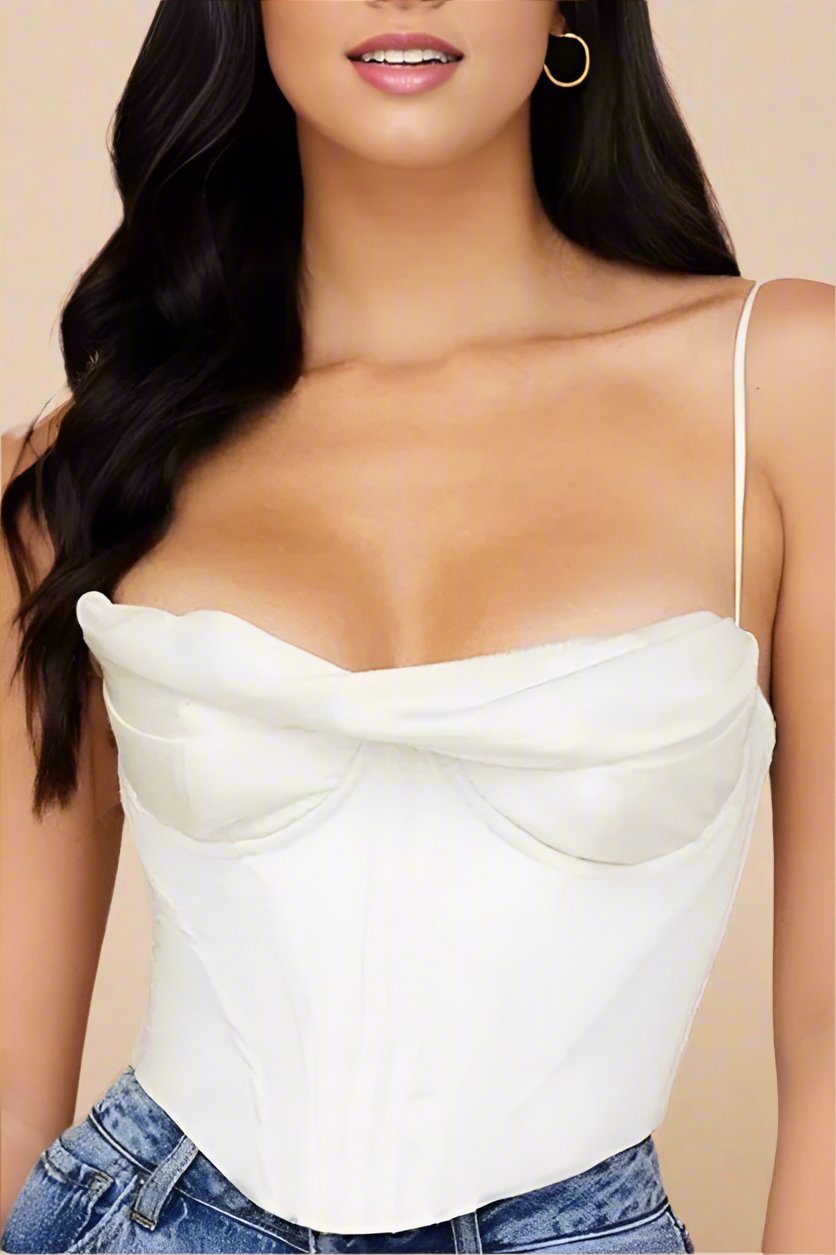 Woman wearing a figure flattering  Indi Corset Crop Top - Pearl White BODYCON COLLECTION