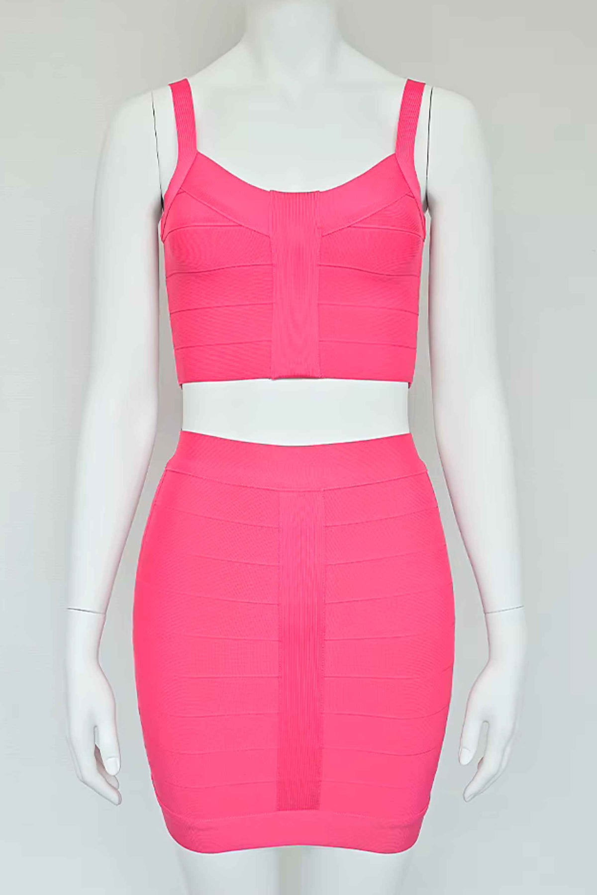 Woman wearing a figure flattering  India Bandage Top and Mini Skirt Set - Hot Pink BODYCON COLLECTION