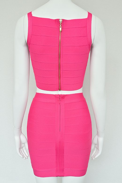 Woman wearing a figure flattering  India Bandage Top and Mini Skirt Set - Hot Pink BODYCON COLLECTION