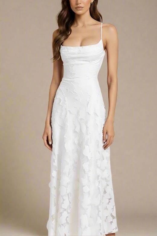 Woman wearing a figure flattering  Ivy Bodycon Maxi Dress - White Pearl BODYCON COLLECTION