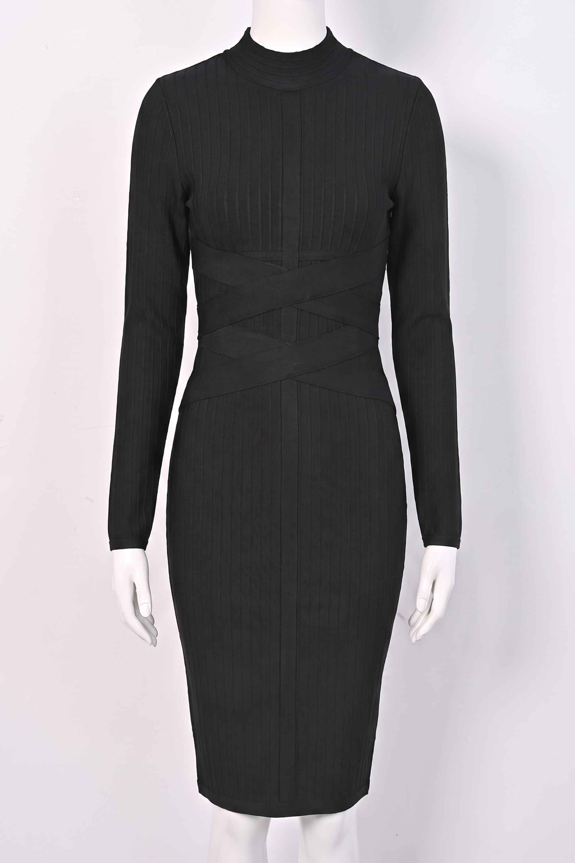 Woman wearing a figure flattering  Jane Long Sleeve Bodycon Midi Dress - Classic Black Bodycon Collection