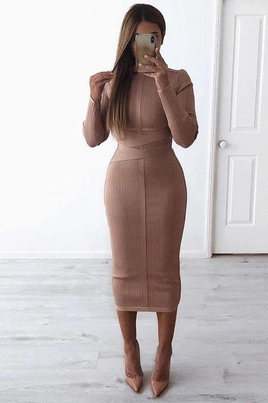 Woman wearing a figure flattering  Jane Long Sleeve Bodycon Midi Dress - Nude Bodycon Collection