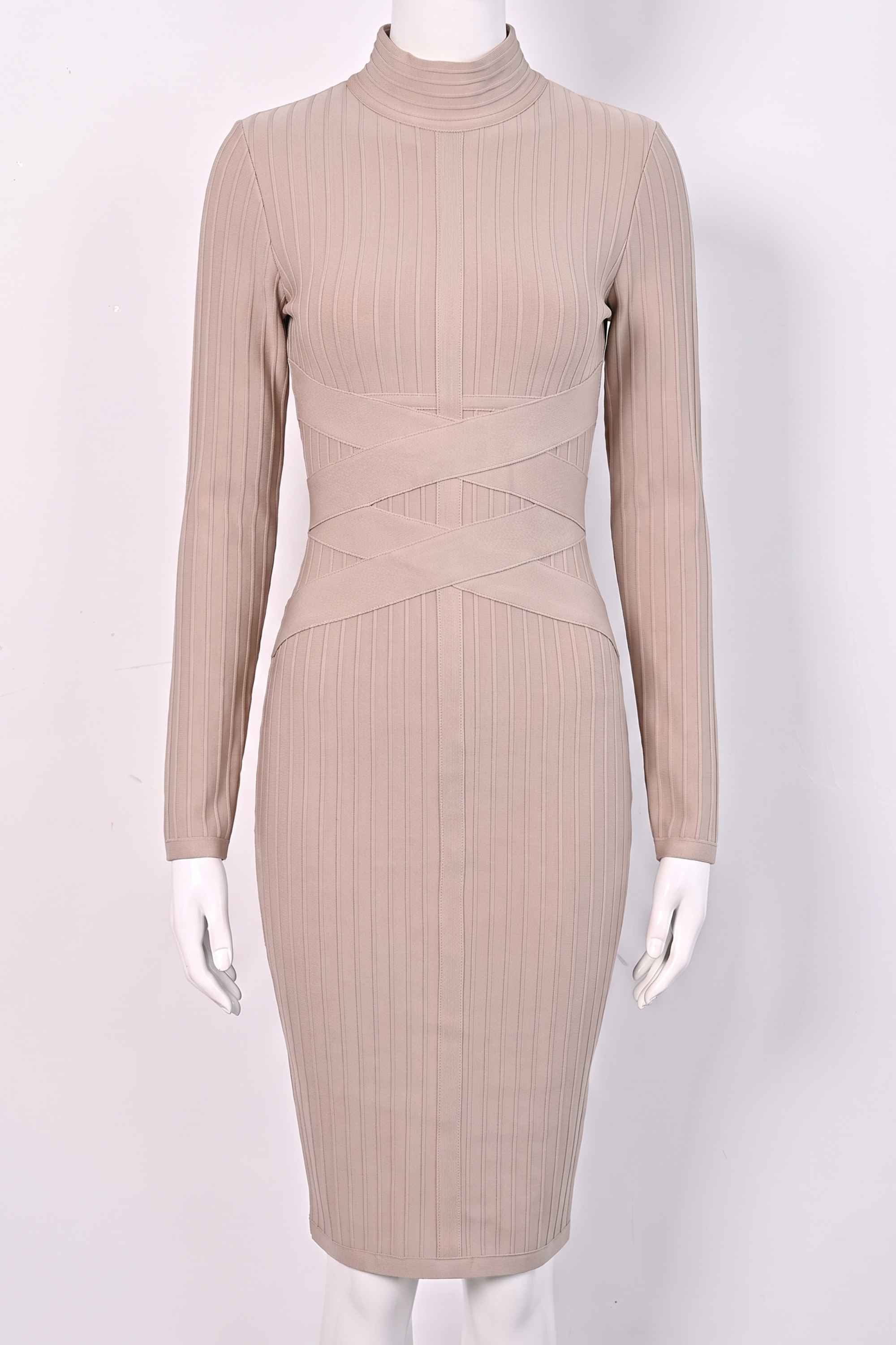 Woman wearing a figure flattering  Jane Long Sleeve Bodycon Midi Dress - Nude Bodycon Collection