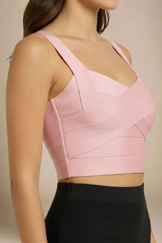 Woman wearing a figure flattering  Jay Bandage Crop Top - Dusty Pink BODYCON COLLECTION