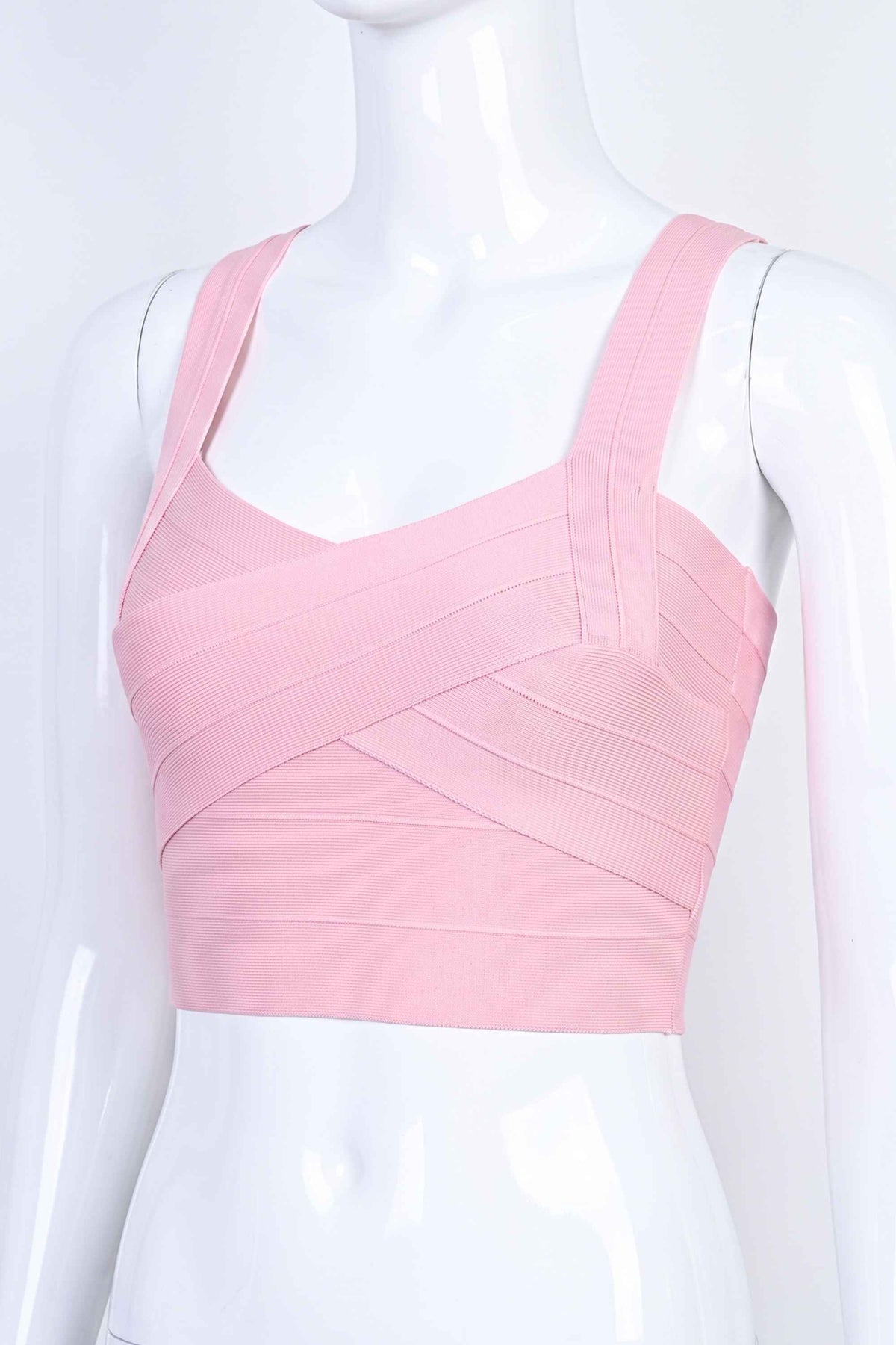 Woman wearing a figure flattering  Jay Bandage Crop Top - Dusty Pink BODYCON COLLECTION