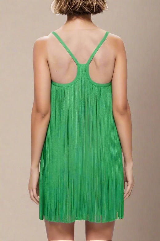 Woman wearing a figure flattering  Jazel Bodycon Mini Dress - Emerald Green BODYCON COLLECTION