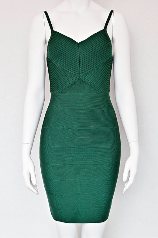 Woman wearing a figure flattering  Jene Bandage Dress - Emerald Green BODYCON COLLECTION