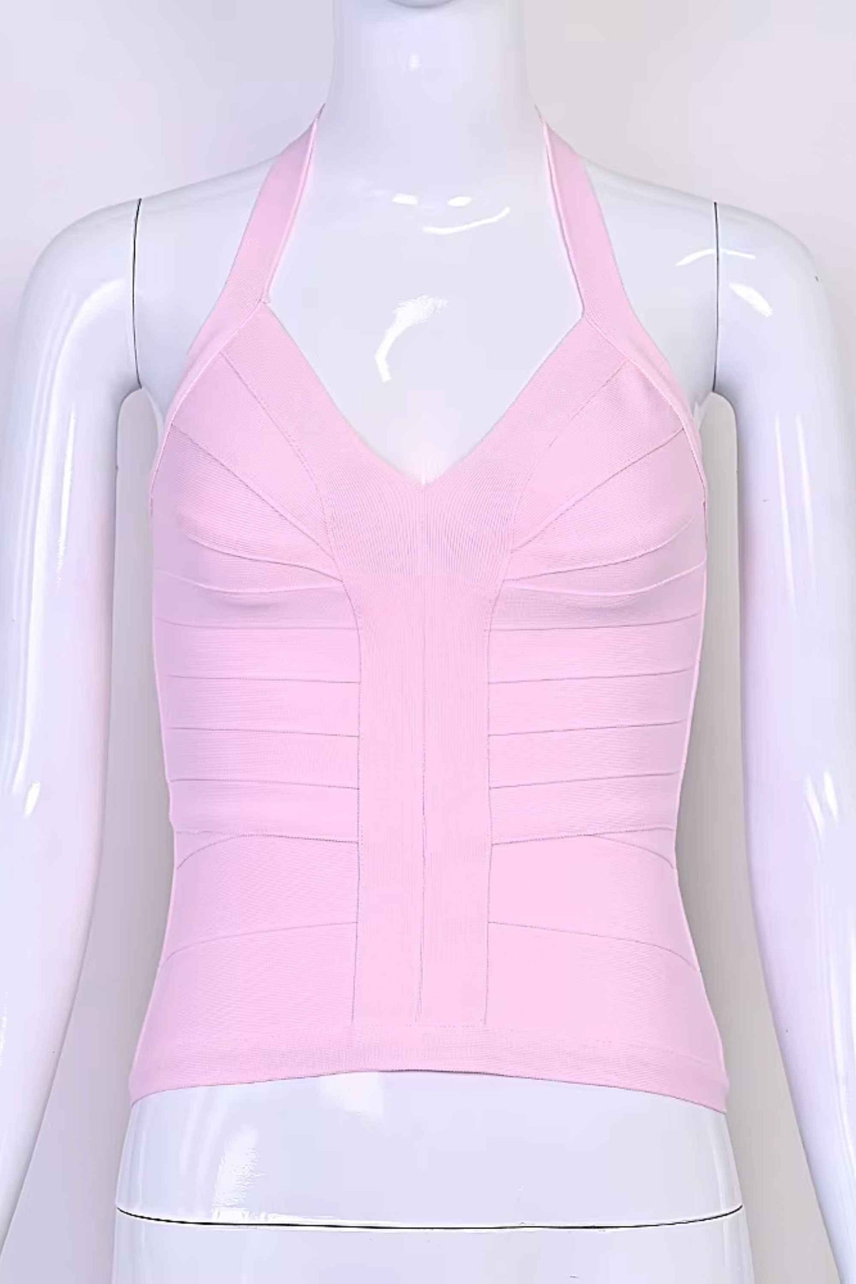 Woman wearing a figure flattering  Jenna Bandage Top - Dusty Pink BODYCON COLLECTION Pty Ltd
