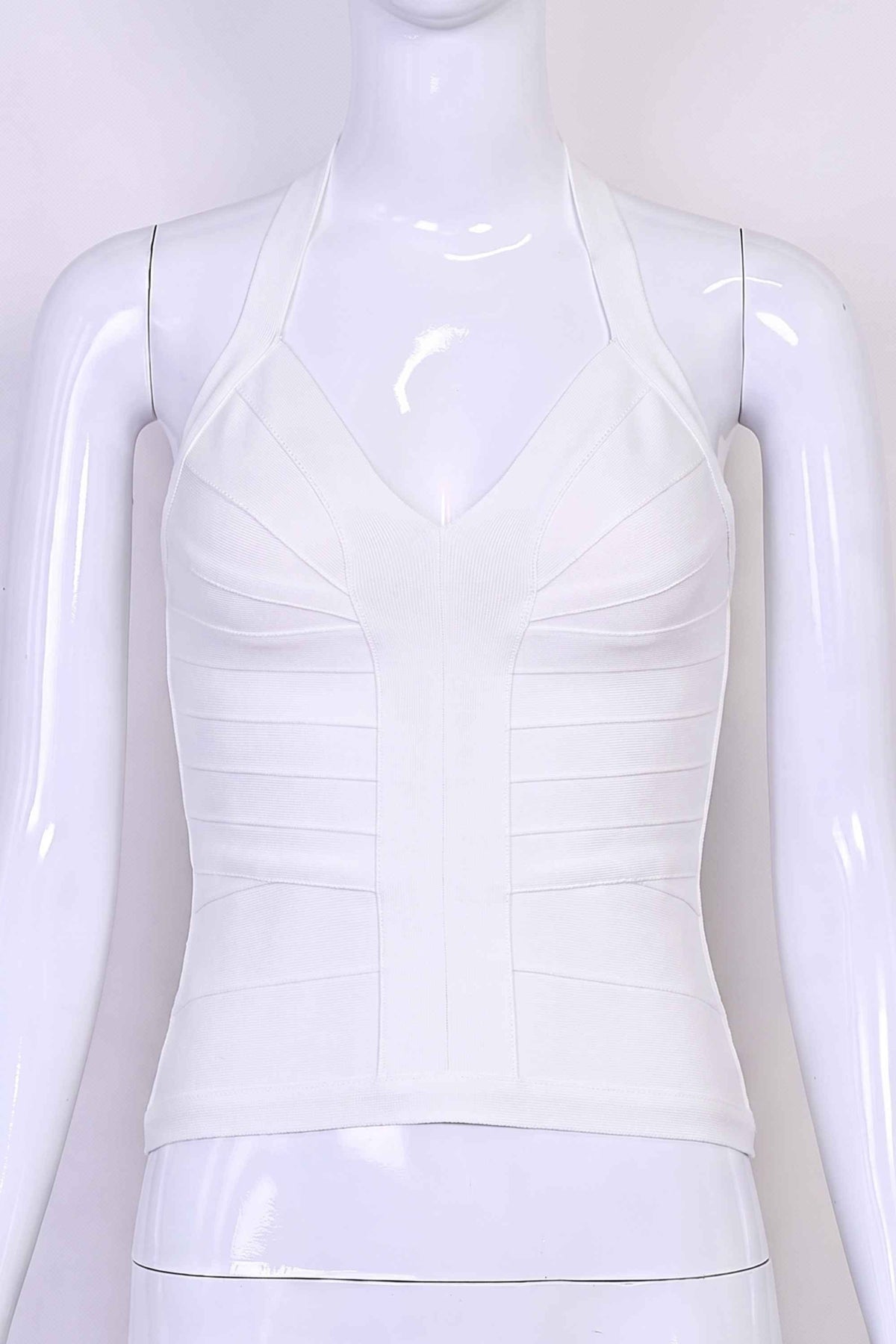 Woman wearing a figure flattering  Jenna Bandage Top - White Pearl BODYCON COLLECTION Pty Ltd