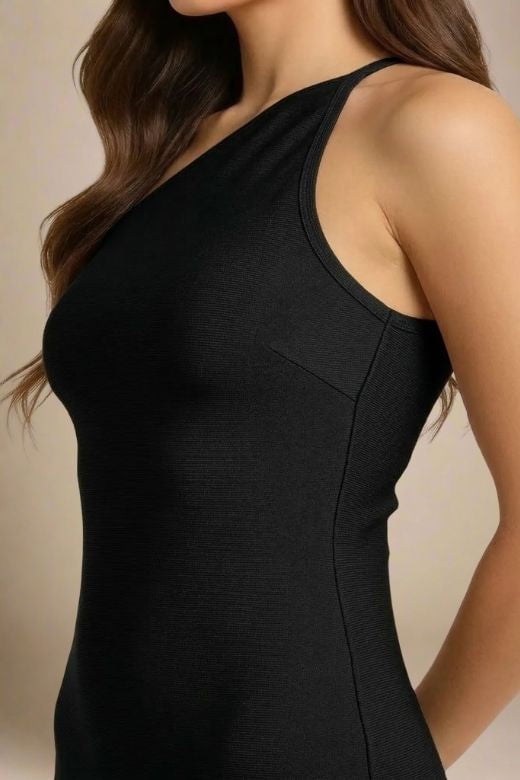 Woman wearing a figure flattering  Joi Bodycon Midi Dress - Classic Black Bodycon Collection