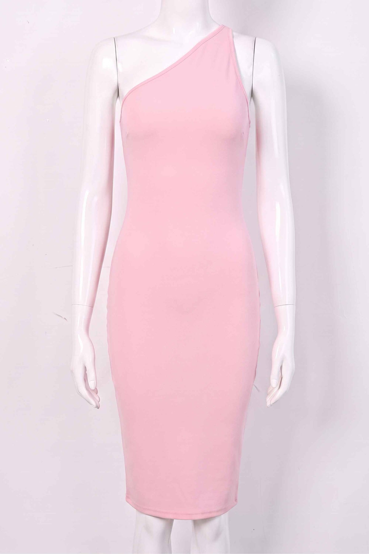 Woman wearing a figure flattering  Joi Bodycon Midi Dress - Dusty Pink Bodycon Collection