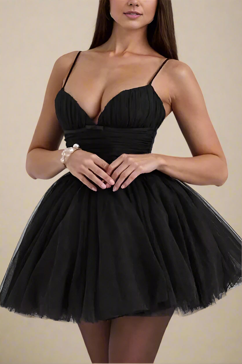 Woman wearing a figure flattering  Kaya Bodycon Mini Wrap Tulle Dress - Classic Black BODYCON COLLECTION