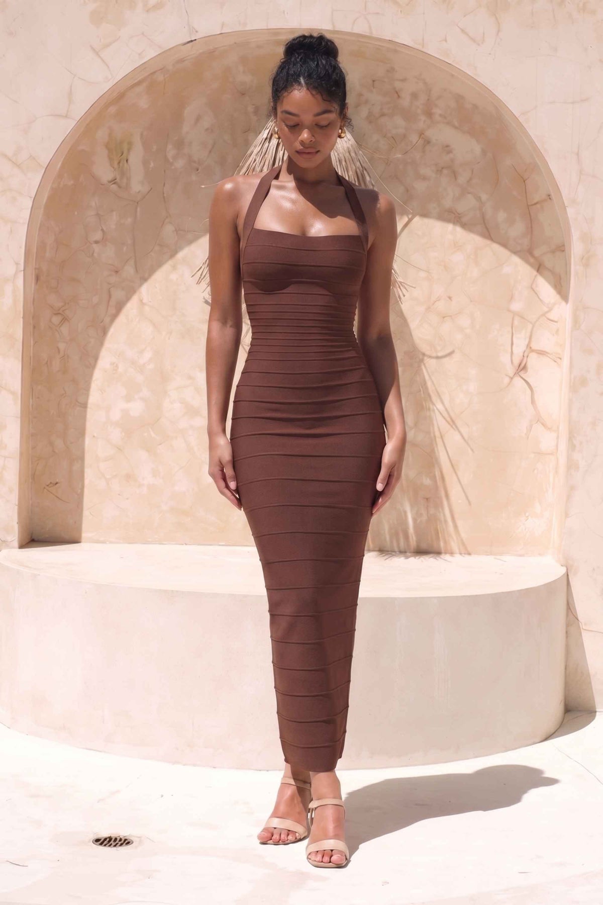 Woman wearing a figure flattering  Kia Bandage Maxi Dress - Chocolate Brown BODYCON COLLECTION Pty Ltd