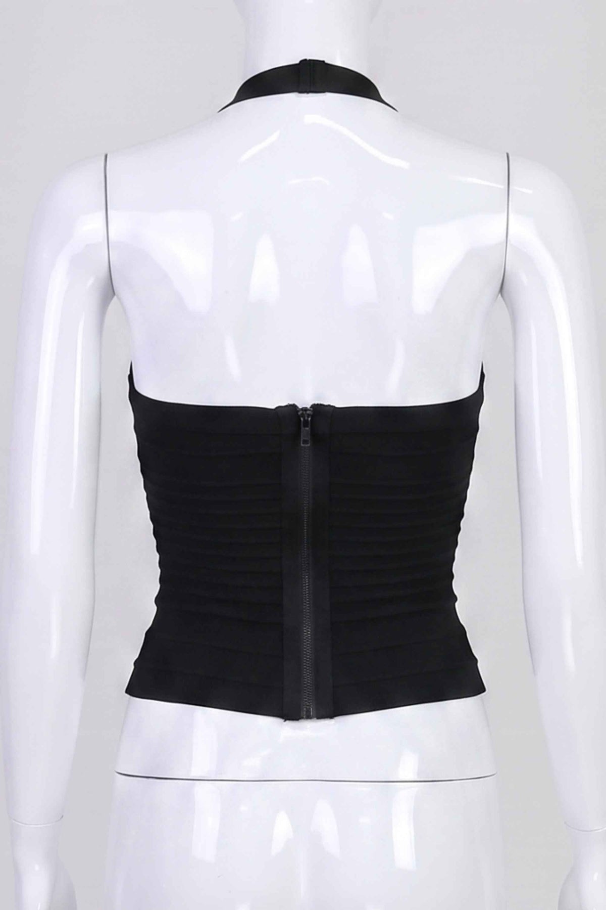 Woman wearing a figure flattering  Kia Bandage Top - Classic Black BODYCON COLLECTION Pty Ltd