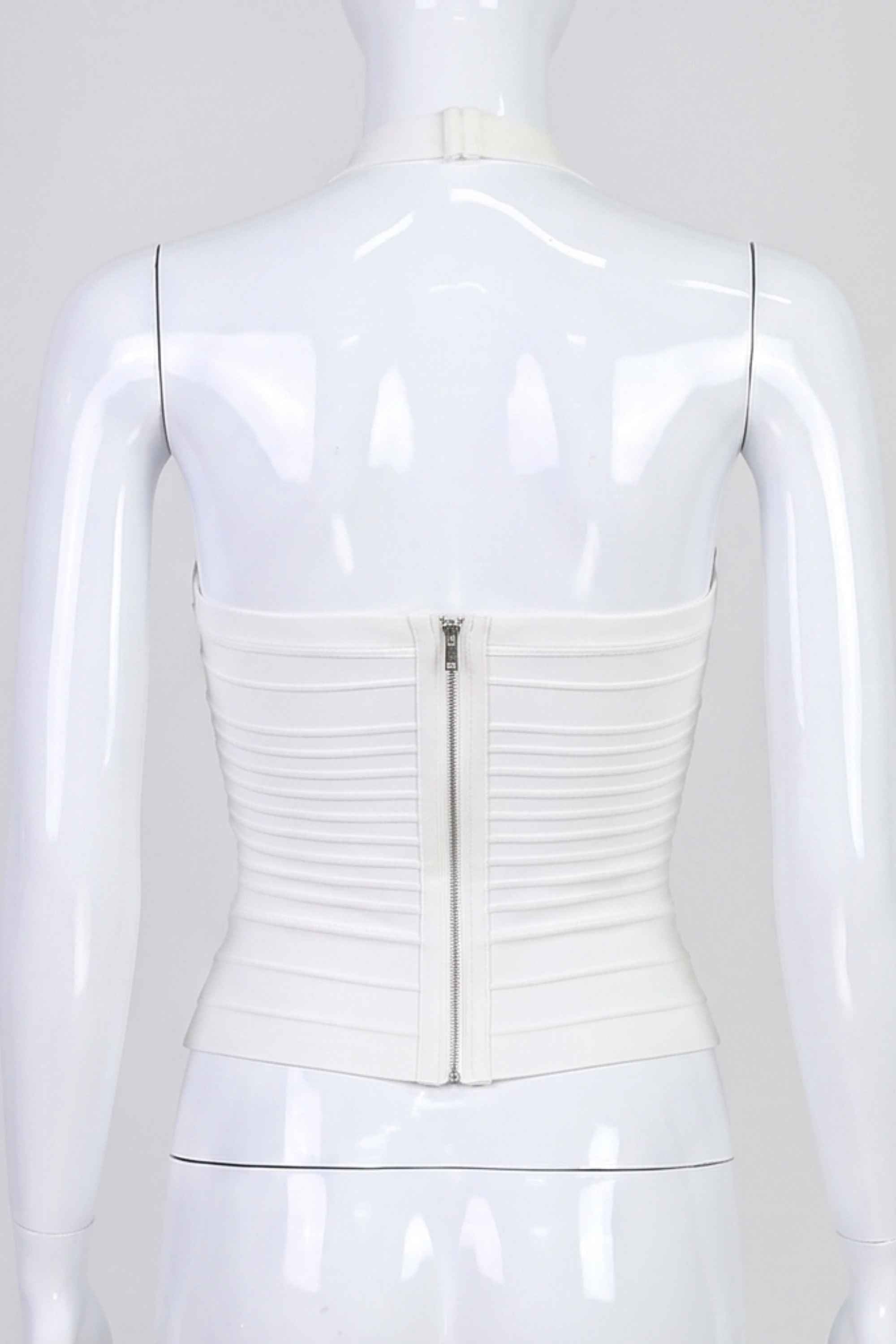 Woman wearing a figure flattering  Kia Bandage Top - Pearl White BODYCON COLLECTION Pty Ltd