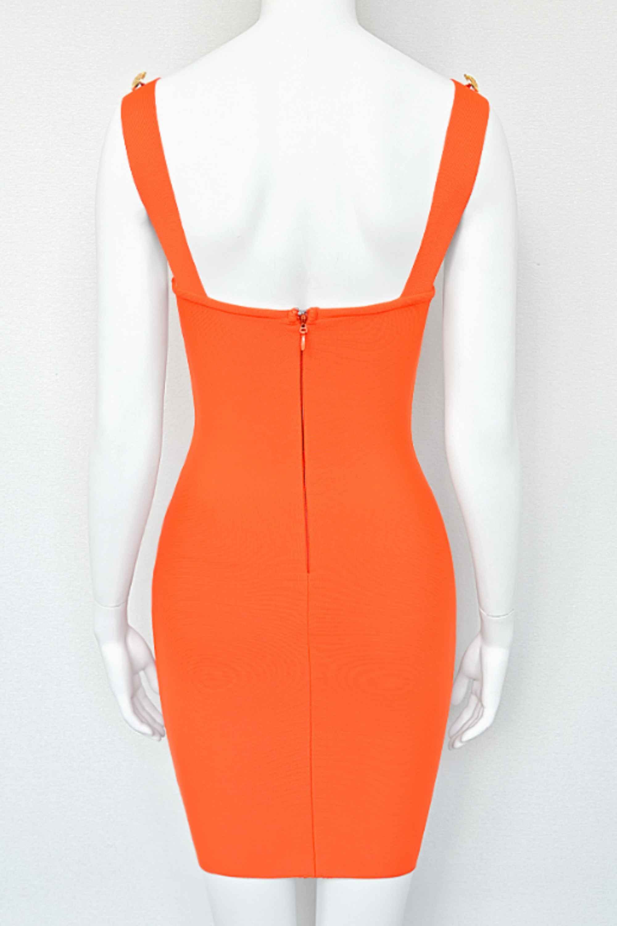 Woman wearing a figure flattering  Kiki Bandage Mini Dress - Apricot Orange BODYCON COLLECTION