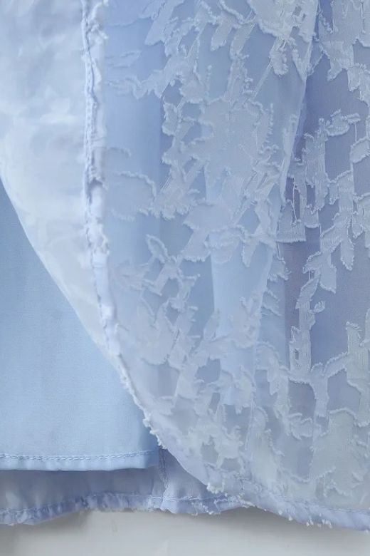 Woman wearing a figure flattering  Kora Bodycon Maxi Dress - Baby Blue BODYCON COLLECTION