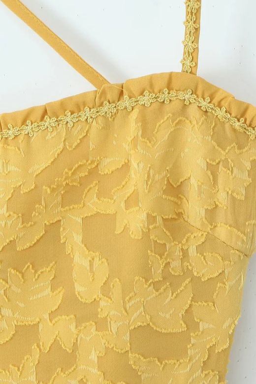 Woman wearing a figure flattering  Kora Bodycon Maxi Dress - Lemon Yellow BODYCON COLLECTION