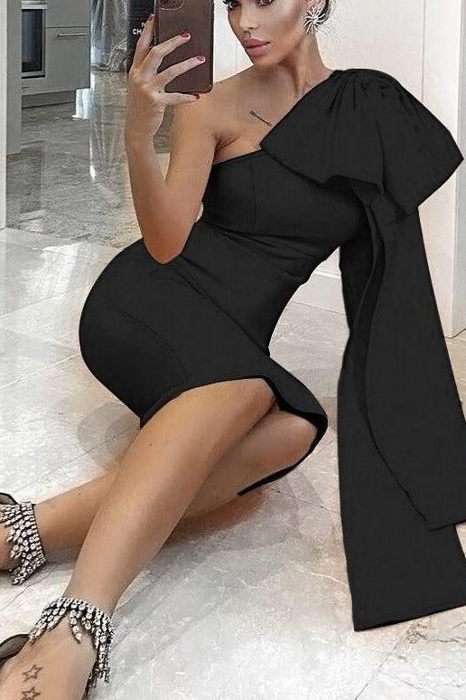 Woman wearing a figure flattering  Lela Long Sleeve Bandage Midi Dress - Classic Black BODYCON COLLECTION