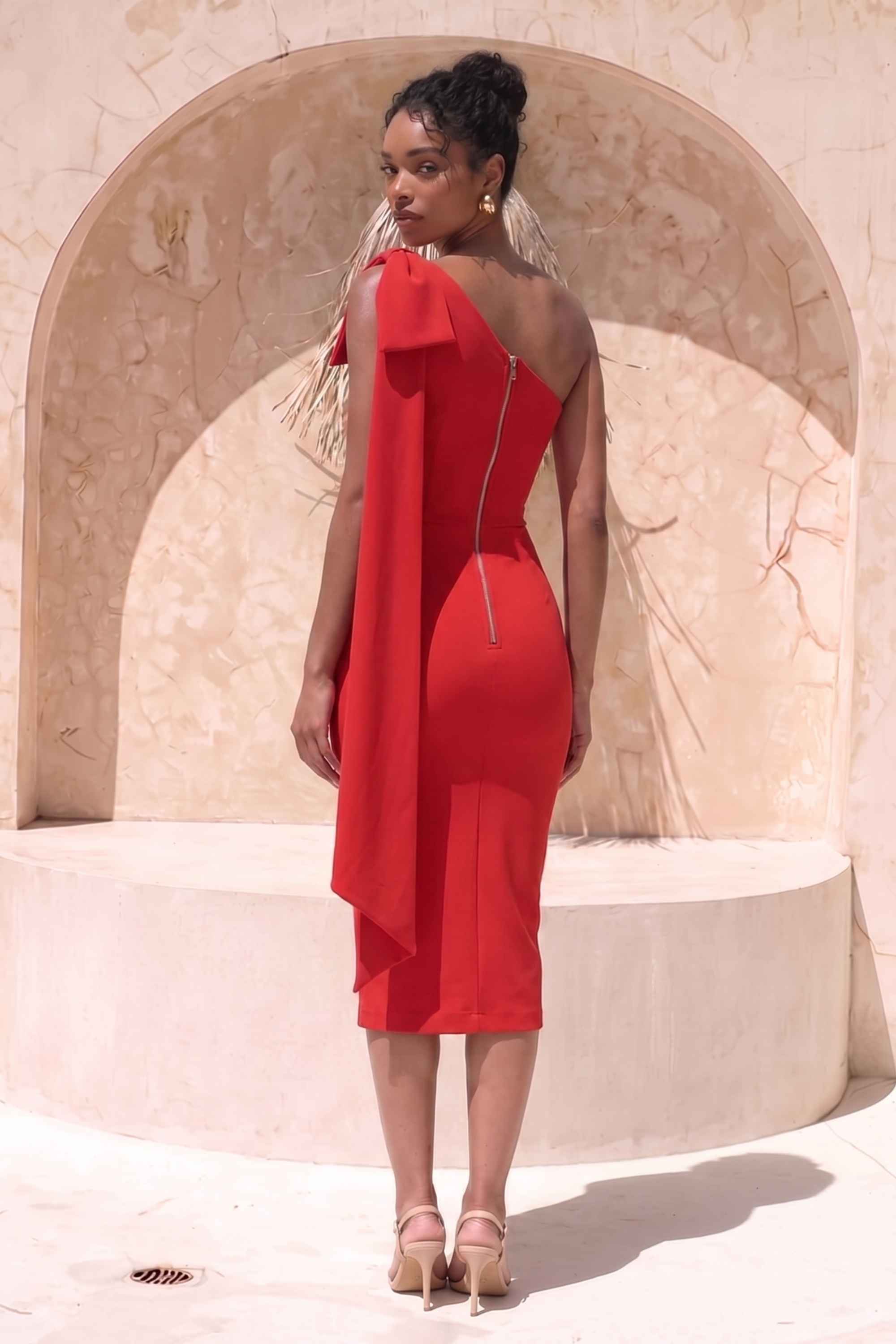 Woman wearing a figure flattering  Lela Long Sleeve Bandage Midi Dress - Lipstick Red BODYCON COLLECTION