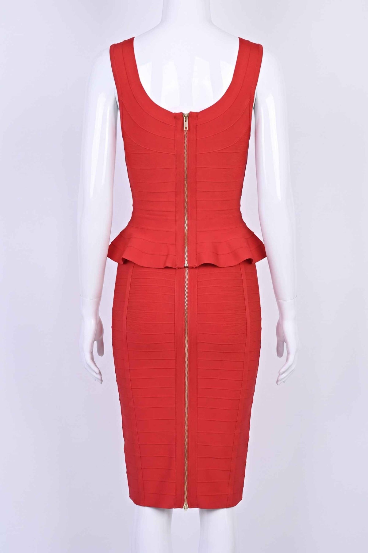 Woman wearing a figure flattering  Leni Bandage Top and Knee Length Skirt Set - Lipstick Red BODYCON COLLECTION