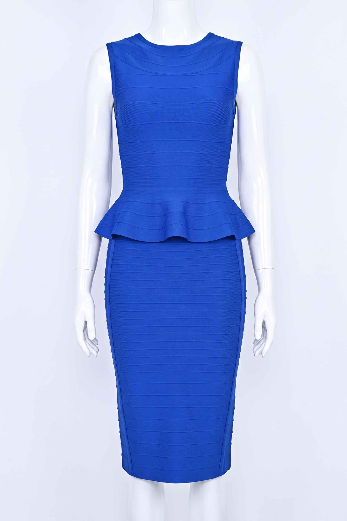Woman wearing a figure flattering  Leni Bandage Top and Knee Length Skirt Set - Royal Blue BODYCON COLLECTION