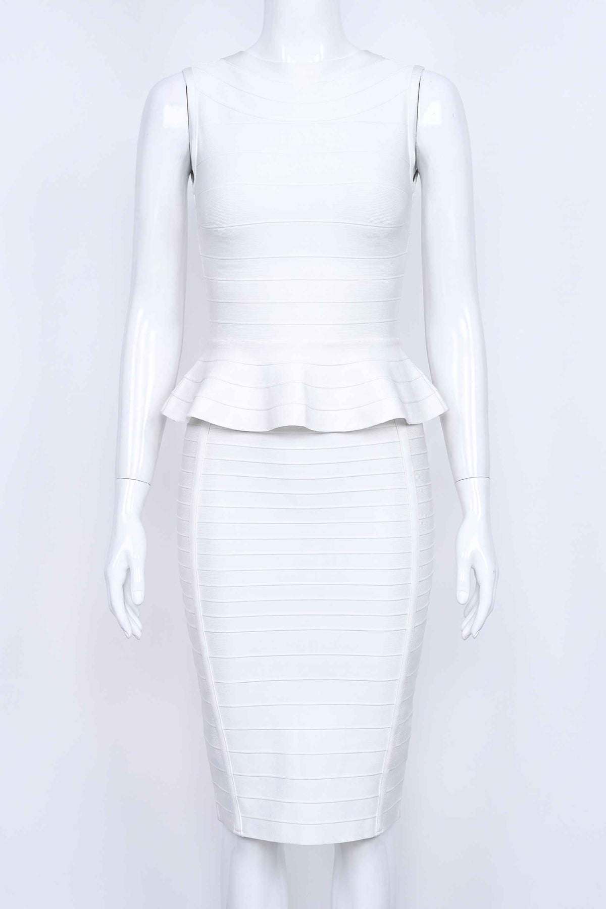 Woman wearing a figure flattering  Leni Bandage Top and Knee Length Skirt Set - White Pearl BODYCON COLLECTION
