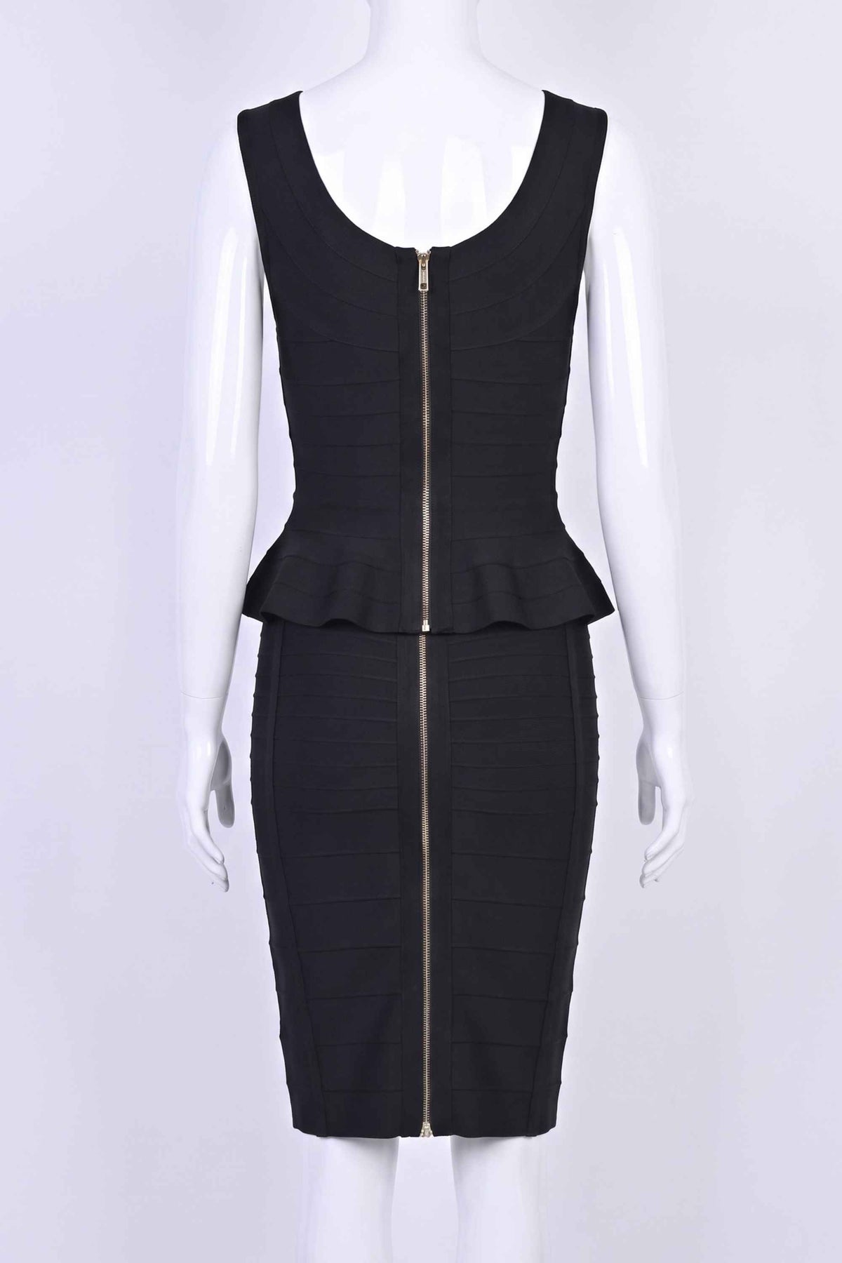 Woman wearing a figure flattering  Leni Bandage Top - Classic Black BODYCON COLLECTION