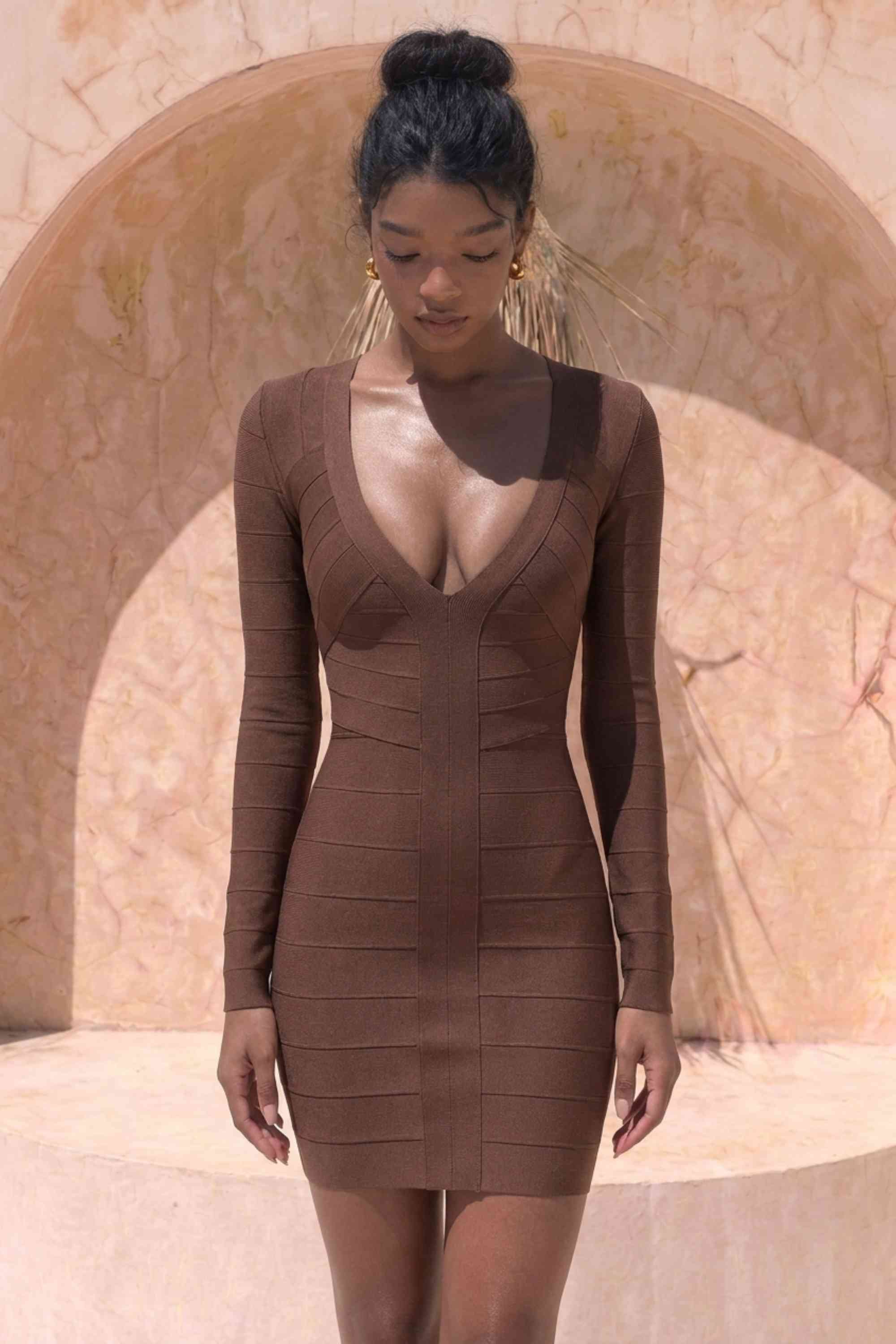 Woman wearing a figure flattering  Lisa Long Sleeve Bandage Mini Dress - Chocolate Brown BODYCON COLLECTION Pty Ltd