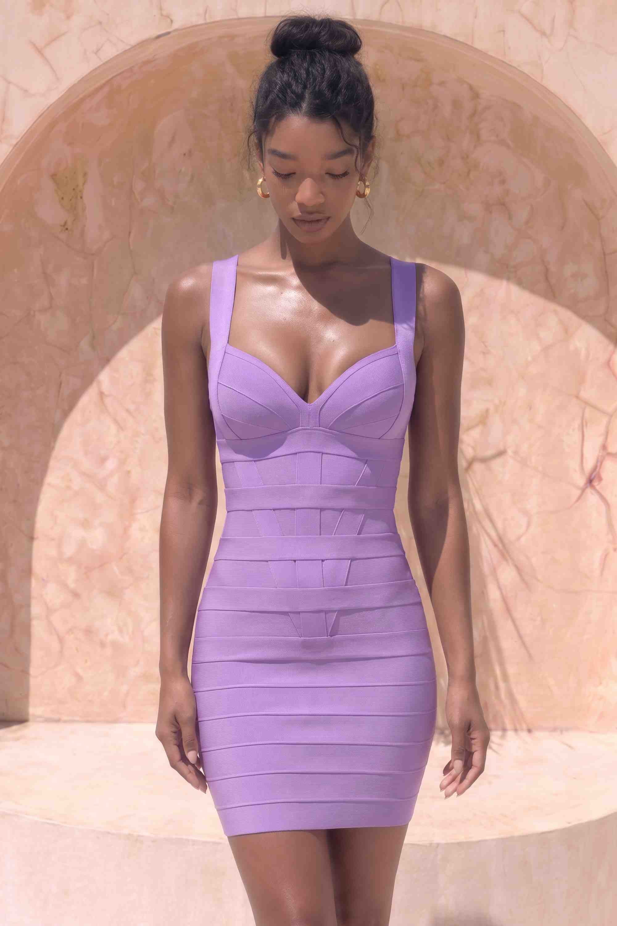 Woman wearing a figure flattering  Madison Bandage Mini Dress - Violet Purple BODYCON COLLECTION Pty Ltd