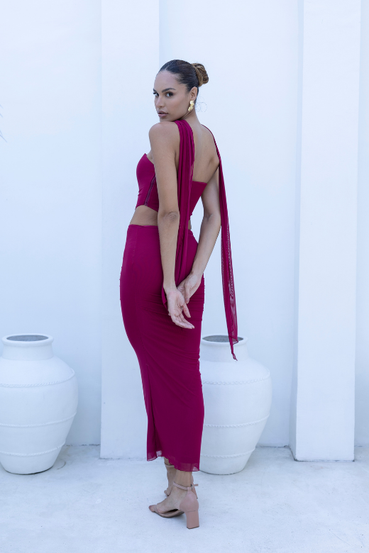 Woman wearing a figure flattering  Margot Wrap Top and Maxi Skirt Outfit Set - Red Wine BODYCON COLLECTION