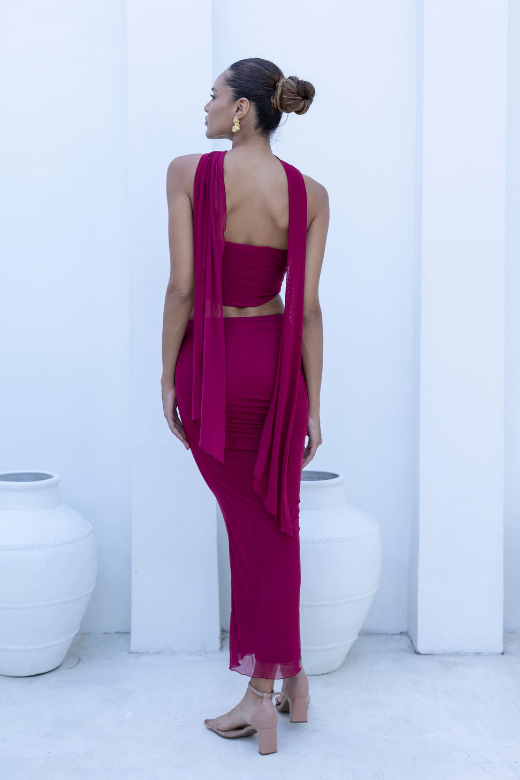 Woman wearing a figure flattering  Margot Wrap Top and Maxi Skirt Outfit Set - Red Wine BODYCON COLLECTION