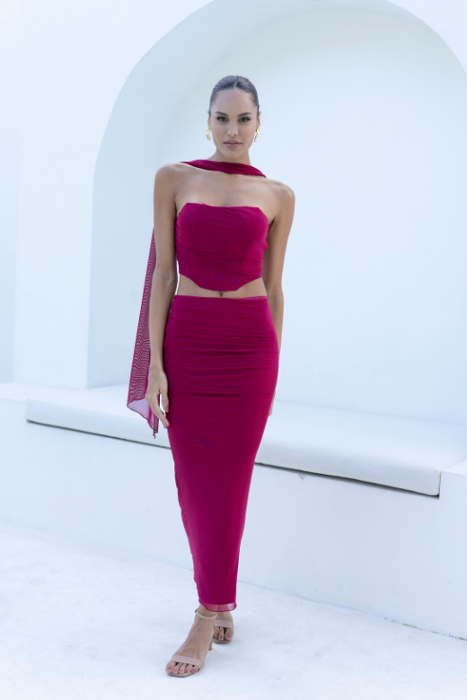 Woman wearing a figure flattering  Margot Wrap Top and Maxi Skirt Outfit Set - Red Wine BODYCON COLLECTION
