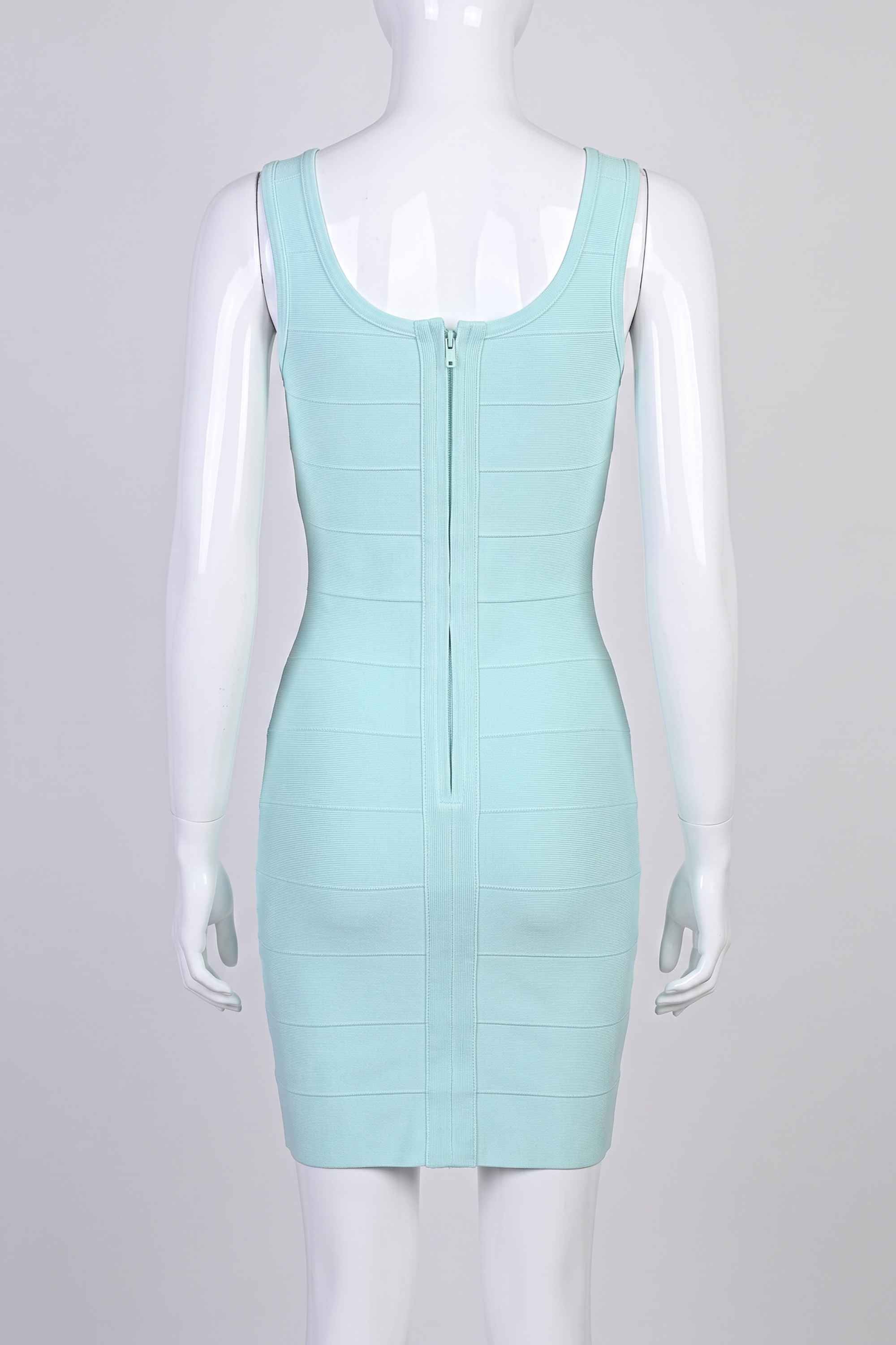 Woman wearing a figure flattering  Maria Bandage Mini Dress - Baby Blue BODYCON COLLECTION