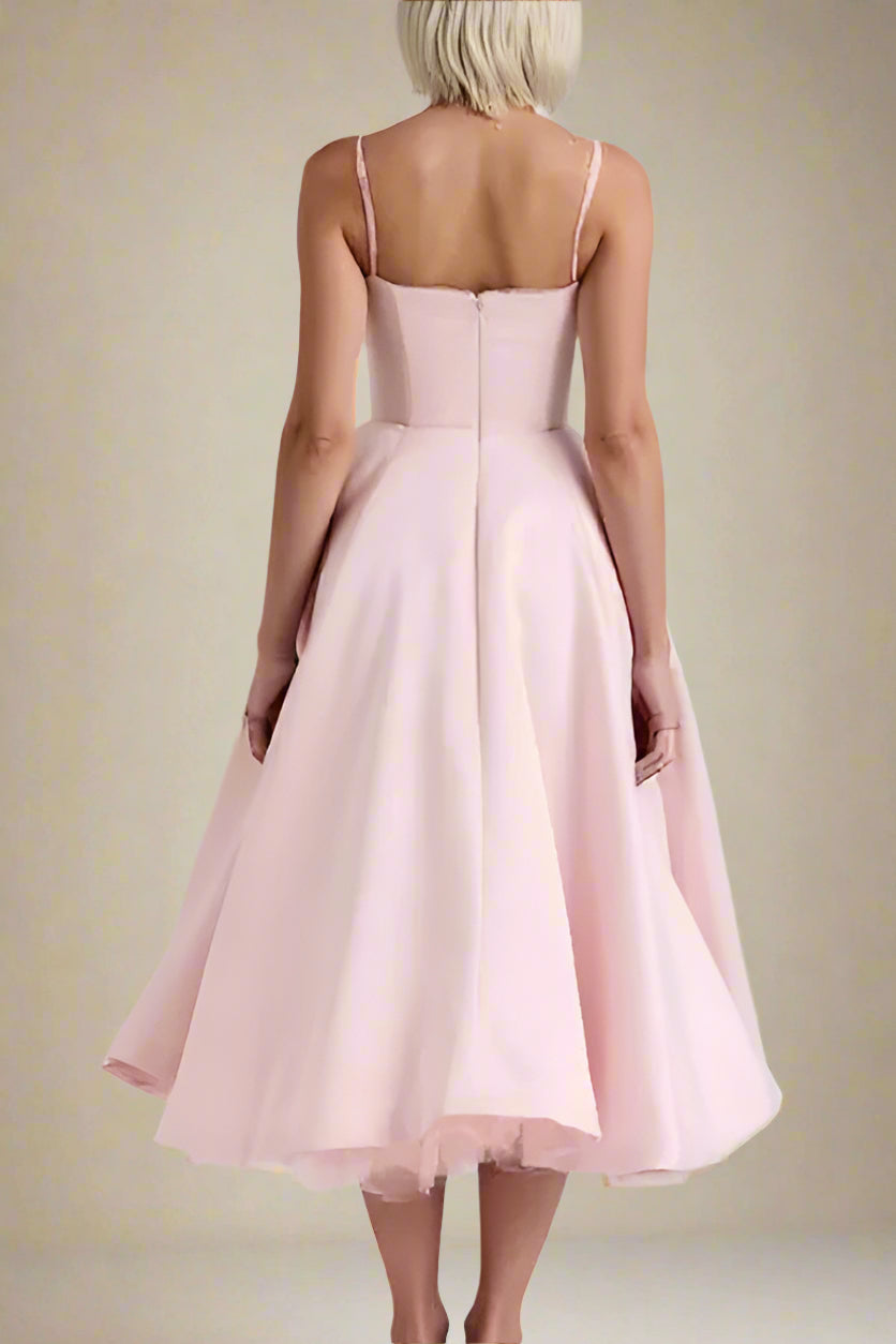 Woman wearing a figure flattering  Mavis Bodycon Midi Dress - Dusty Pink BODYCON COLLECTION