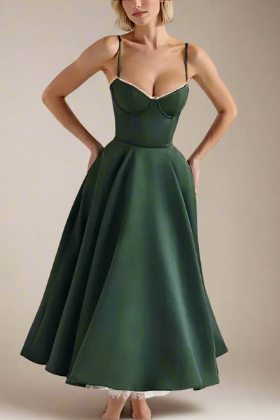 Woman wearing a figure flattering  Mavis Bodycon Midi Dress - Emerald Green BODYCON COLLECTION