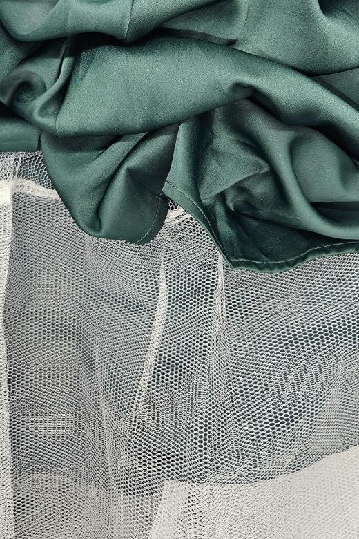 Woman wearing a figure flattering  Mavis Midi Dress - Emerald Green BODYCON COLLECTION