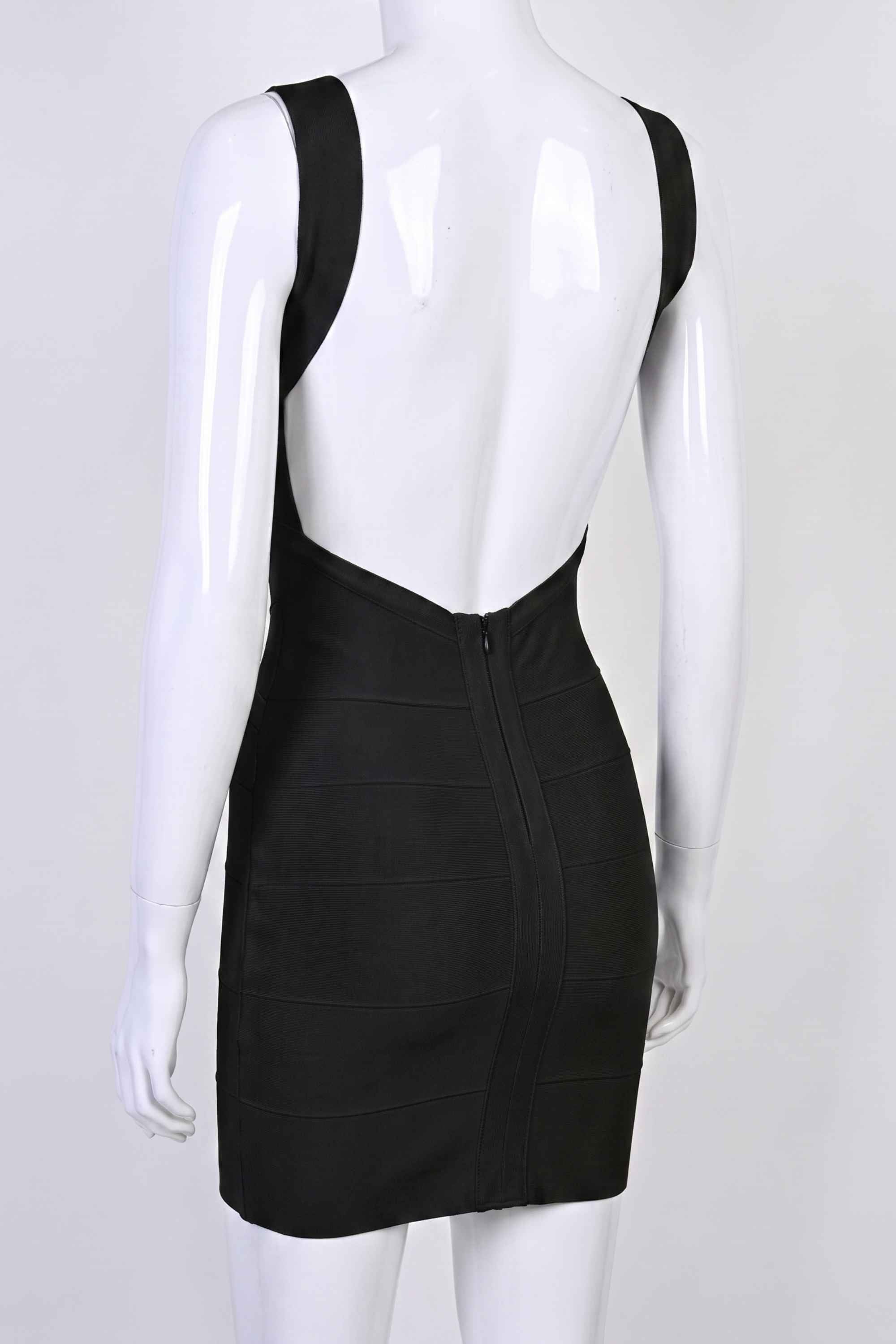 Woman wearing a figure flattering  Maya Bandage Mini Dress - Classic Black BODYCON COLLECTION
