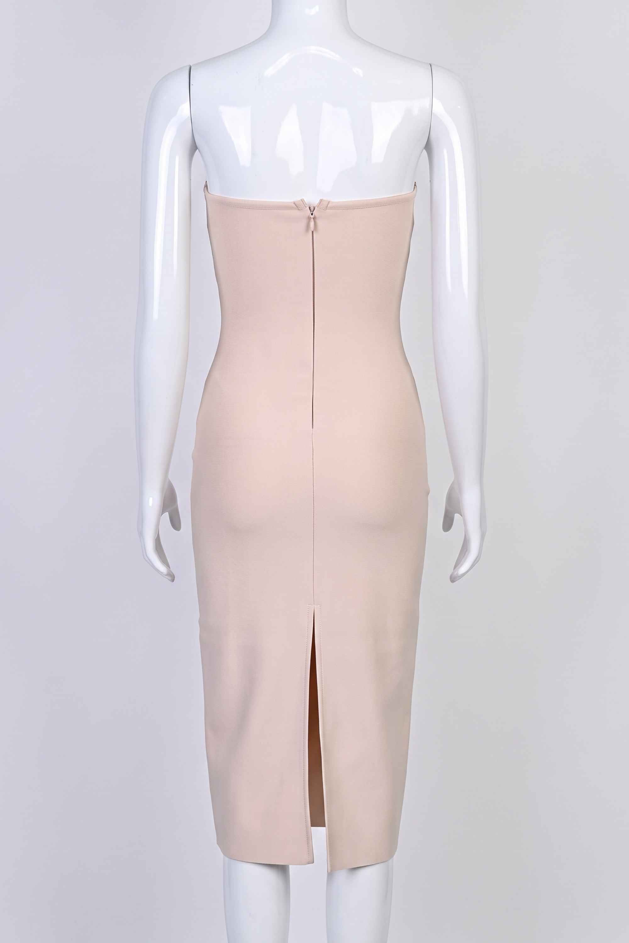Woman wearing a figure flattering  Miles Bodycon Midi Dress - Nude BODYCON COLLECTION